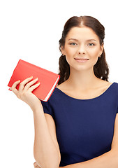 Image showing happy and smiling woman with book