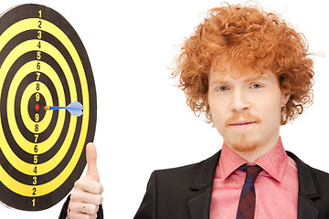 Image showing businessman with dart and target