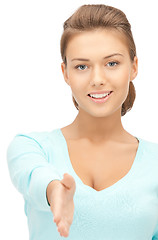 Image showing woman with an open hand ready for handshake