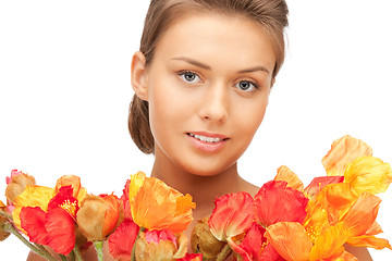 Image showing lovely woman with red flowers