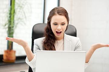 Image showing happy woman with laptop computer