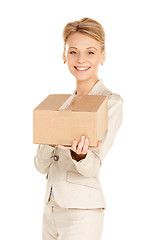 Image showing attractive businesswoman with cardboard box