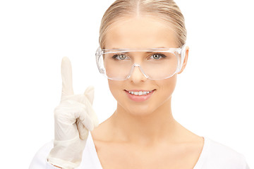 Image showing woman in protective glasses and gloves