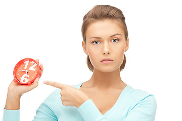 Image showing woman holding alarm clock