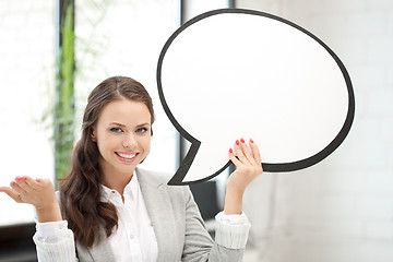 Image showing smiling businesswoman with blank text bubble