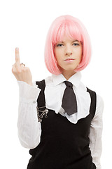 Image showing schoolgirl with pink hair showing middle finger