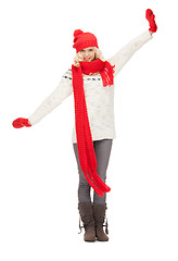 Image showing beautiful woman in hat, muffler and mittens