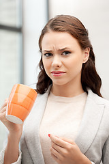 Image showing lovely businesswoman with mug