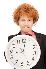 Image showing man with clock