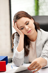 Image showing calm woman with book