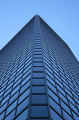 Image showing Angle view of a glass-windowed skyscraper