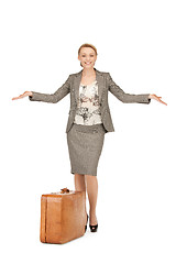 Image showing lovely woman with suitcase