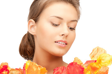 Image showing lovely woman with red flowers