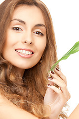 Image showing woman with green leaf