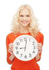 Image showing woman holding big clock