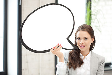 Image showing smiling businesswoman with blank text bubble