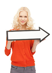 Image showing businesswoman with direction arrow sign