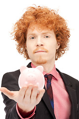 Image showing man with piggy bank