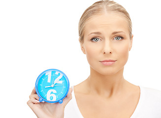 Image showing woman holding alarm clock