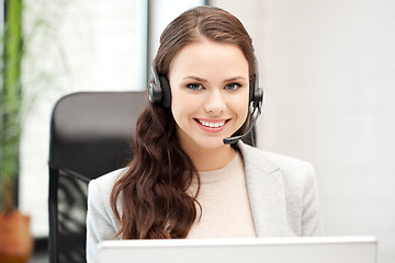 Image showing helpline operator with laptop computer