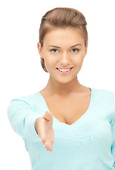 Image showing woman with an open hand ready for handshake