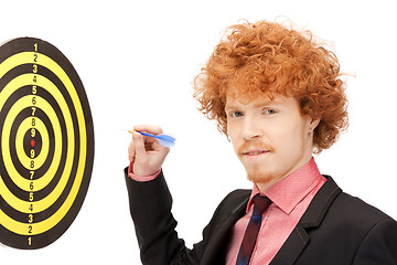 Image showing businessman with dart and target