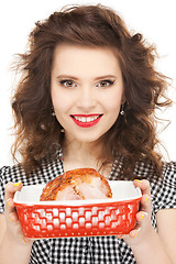 Image showing lovely housewife with meat