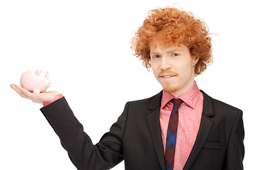 Image showing man with piggy bank