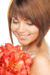 Image showing lovely woman with red flowers