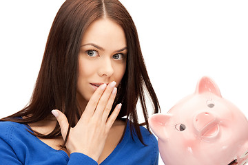 Image showing lovely woman with piggy bank