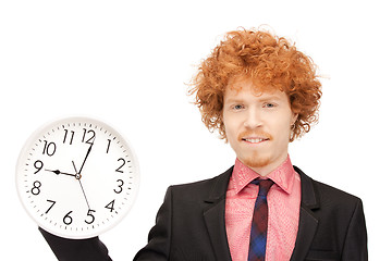 Image showing man with clock