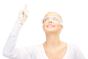 Image showing woman in protective glasses and gloves