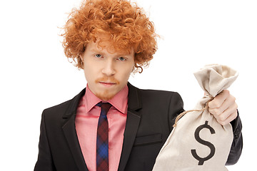 Image showing man with dollar signed bag