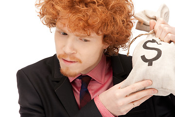 Image showing man with dollar signed bag