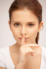 Image showing finger on lips