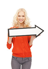 Image showing businesswoman with direction arrow sign