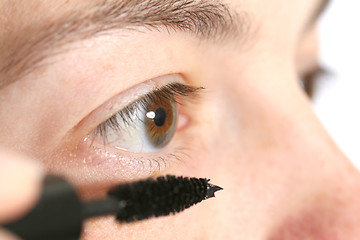 Image showing Applying mascara