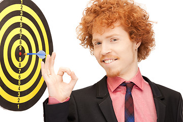 Image showing businessman with dart and target