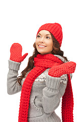 Image showing beautiful woman in hat, muffler and mittens