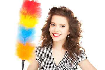 Image showing beautiful woman with cleaning sweep