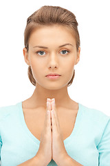 Image showing praying businesswoman