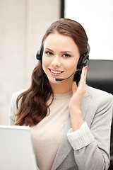 Image showing helpline operator with laptop computer