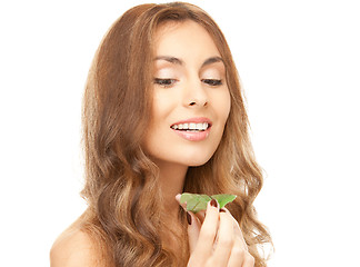 Image showing woman with green leaf