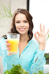 Image showing beautiful woman with glass of juice