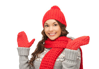 Image showing beautiful woman in hat, muffler and mittens