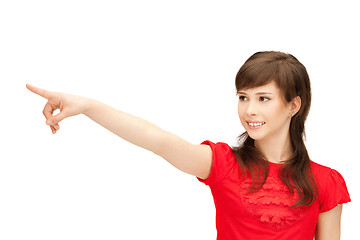 Image showing teenage girl pointing her finger