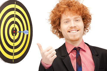 Image showing businessman with dart and target