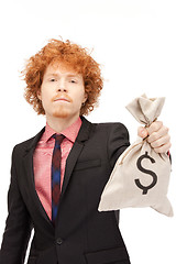 Image showing man with dollar signed bag