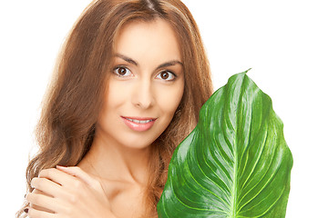 Image showing woman with green leaf