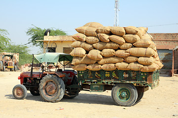 Image showing tractor loaded with bags in india